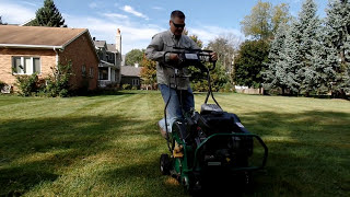 How To Aerate The Lawn  How To Use A Core Aerator [upl. by Aynnat]