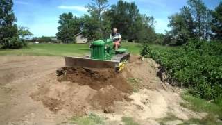 John Deere Model 40 Crawler pushing dirt [upl. by Fredia]