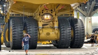 Moving a massive Caterpillar 794AC dump truck [upl. by Llennol]