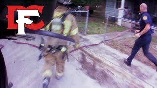 Firefighters Rescue Victim from Burning Home [upl. by Kalman204]