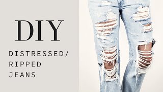 HOW TO  DIY Distressed  Ripped Jeans Tutorial [upl. by Wenonah]