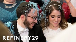 The Deep Meaning Behind An Orthodox Jewish Wedding  World Wide Wed  Refinery29 [upl. by Sulihpoeht]