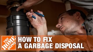 How to Fix a Garbage Disposal  The Home Depot [upl. by Nednal]