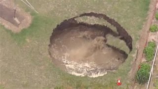 Giant Sinkhole Opens in Backyard [upl. by Joey]